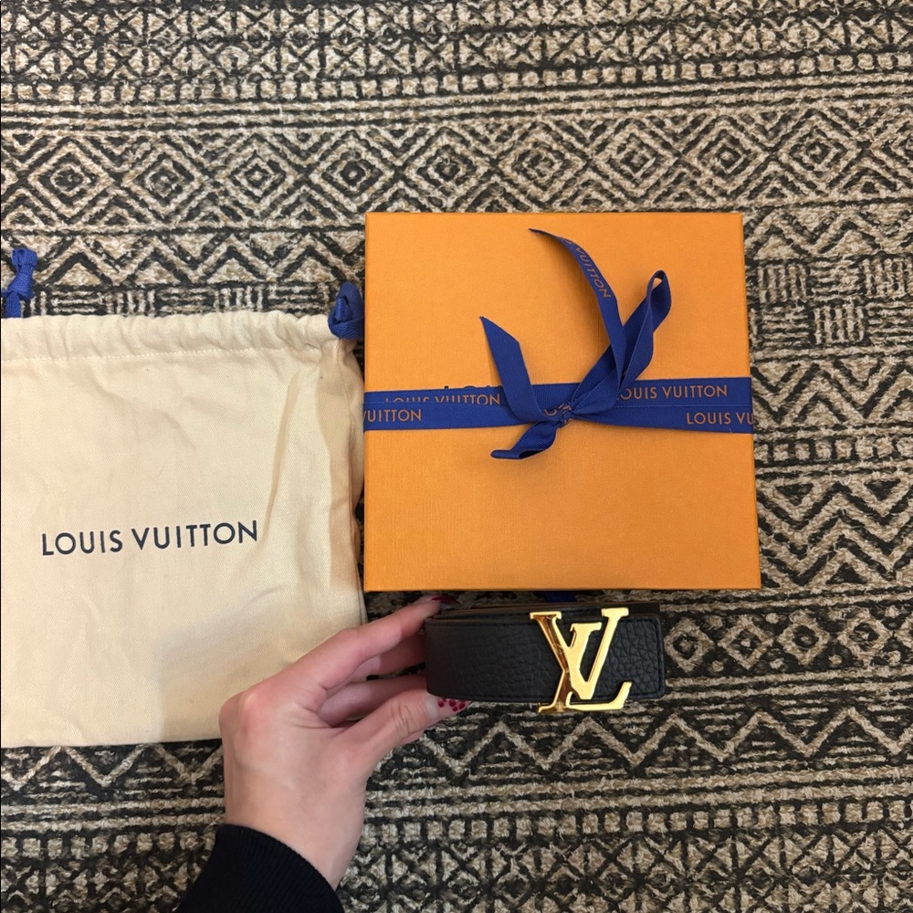 Louis Vuitton black women’s belt size small.Hardly worn great condition.
